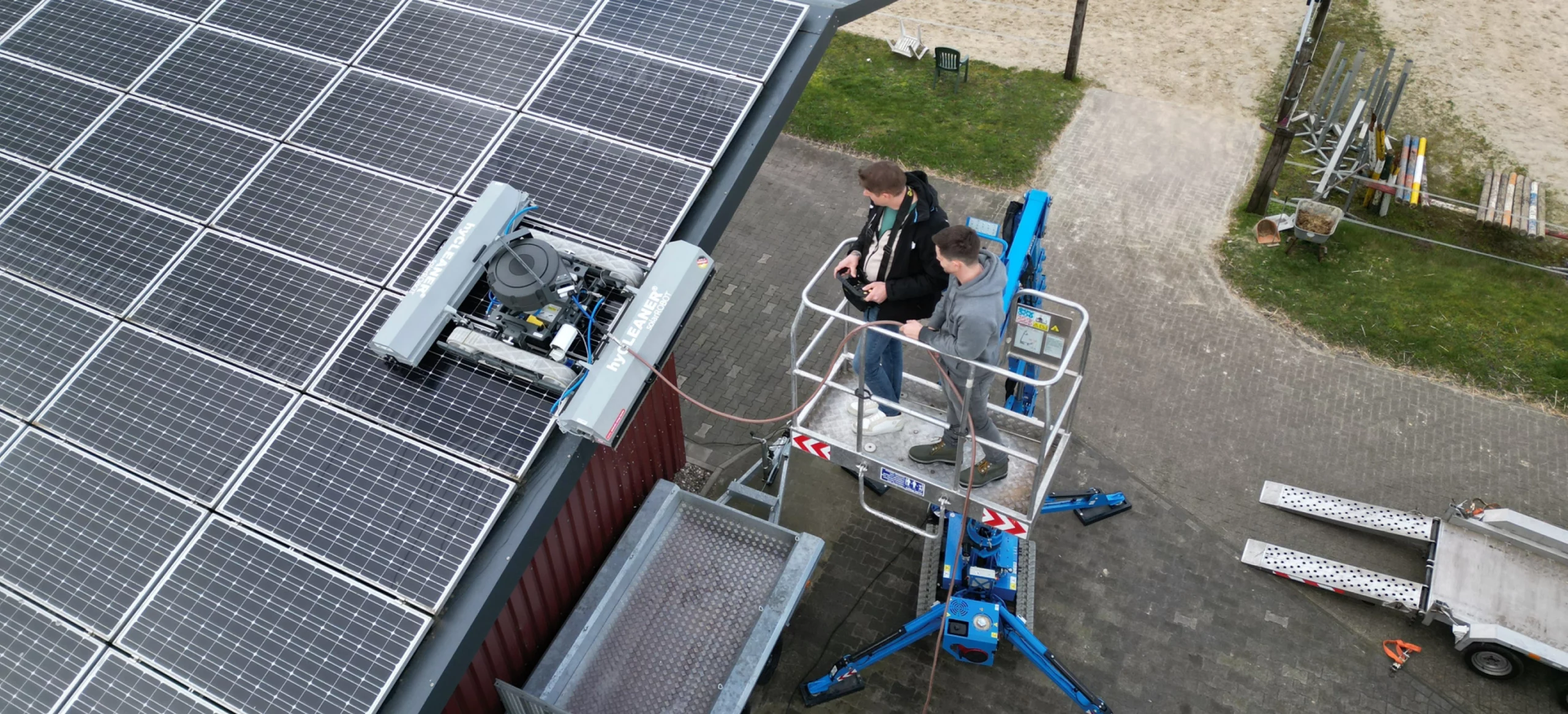 Solar panel cleaning from above with the PV cleaning robot solarROBOT