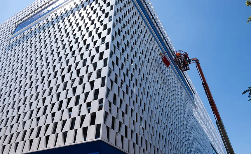 Cleaning of an IKEA building facade with the facadeBRUSH v-line cleaning robot